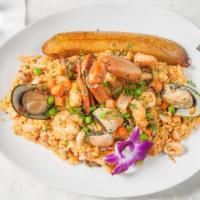 Arroz Con Mariscos · Seasoned rice mixed with plump pink shrimps, green shell mussels, tender squid, clam meat an...