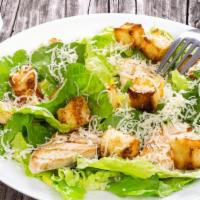 Caesar Salad · Fresh salad made with romaine lettuce, sliced Romano cheese, and homemade garlic croutons.
