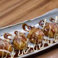 Takoyaki · Favorite. Fried octopus balls with mayonnaise, eel sauce and bonito flakes.