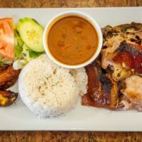 Pernil Asado / Roast Pork · Includes white or yellow rice, beans, sweet plantains, salad, mashed potato, or mixed vegeta...