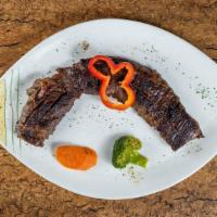 Churrasco / Skirt Steak · Includes white or yellow rice, beans, sweet plantains, salad, mashed potato, or mixed vegeta...