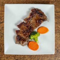 Rib Eye Steak · Includes white or yellow rice, beans, sweet plantains, salad, mashed potato, or mixed vegeta...