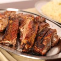 Full Pork Bbq Ribs · Serves 2-3 people. Pork ribs grilled with special seasoning.