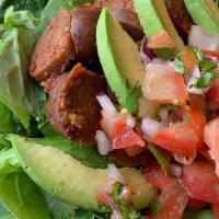 Spicy Devil Salad · Spicy, chipotle sausage, cucumber, onions, tomatoes, avocado and pico de gallo.