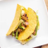 2 Piece Vegan Tacos · Served with choice of two tacos, lettuce, pico de gallo and avocado.