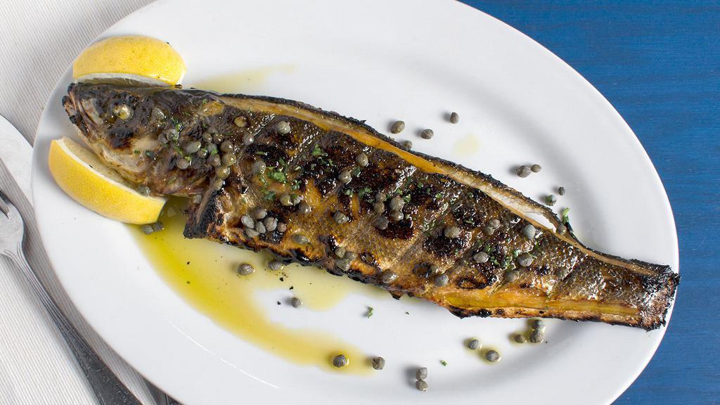 Lavraki · GLUTEN-FREE.Char-grilled Mediterranean whole bronzini with a lemon olive oil sauce. Lean, moist and mild with delicate flakes.