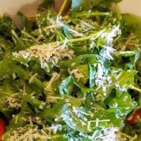 Arugula Salad · Shaved Grana Padano, extra virgin olive oil, lemon juice