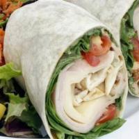 Turkey & Fig Mayo Wrap · Roasted turkey breast, Provolone Cheese, mixed greens, tomatoes, house made fig mayo in a fl...