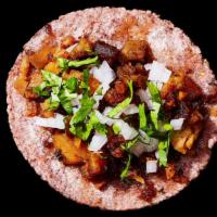 Pork Taco · Heritage Pork Carnitas, Pineapple, Al Pastor Salsa.