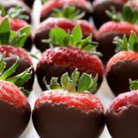 1 Lb. Milk Chocolate Dipped Strawberries · Fresh strawberries dipped in creamy milk chocolate. Approx 12-18 depending on current size.