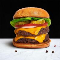 Beyond Double Decker Burger · Two plant-based beyond meat meat patties topped with melted vegan cheddar cheese, grilled on...