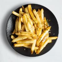 French Fries · Idaho potatoes fried until golden crisp - garnished with sea salt. Served with ketchup.