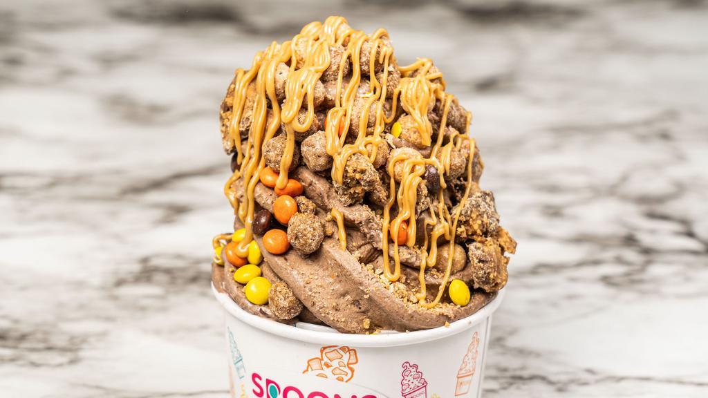 Reese'S Repeat · chocolate ice cream, reese's puffs, reese's peanut butter cups, reese's pieces, peanut butter drizzle.