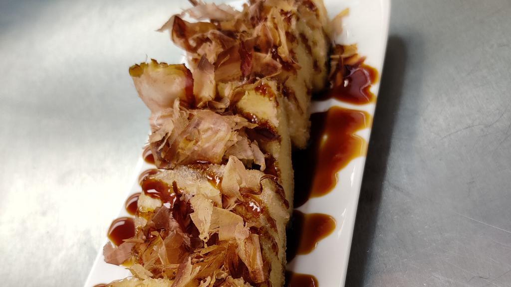 Age Tofu · Fried tofu with House made sauce, topped with Bonito flakes.