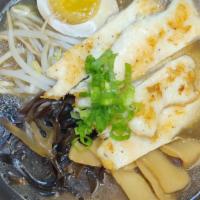 Shoyu Ramen · Grilled chicken, half marinated egg, bean sprouts, bamboo shoots green onion.
