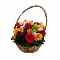 Flower Basket · Flower basket with different flowers such as sunflowers, rose buds and lilies.