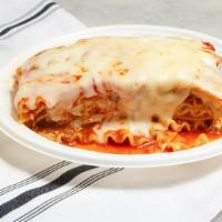 Lasagna · Layers of pasta with fresh ground beef ricotta parmesan and mozzarella cheeses in our own to...
