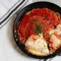 Chicken Cutlet Parmigiana · Includes your choice of pasta or salad.
