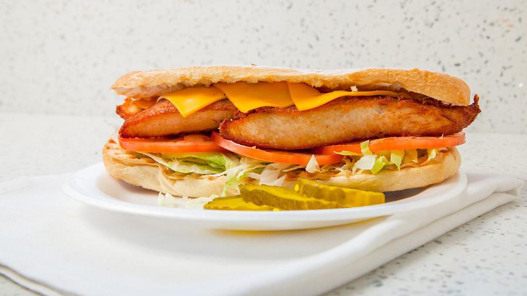 Classic Chicken Cutlet Sandwich · Homemade breaded chicken breast, American cheese, lettuce, tomato, and mayo.