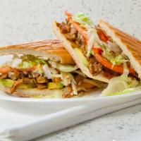 Ikraveit Seitan Sandwich · Seitan mixed with cajun seasoning, salt, pepper, olive oil, and avocado topped with vegan ch...