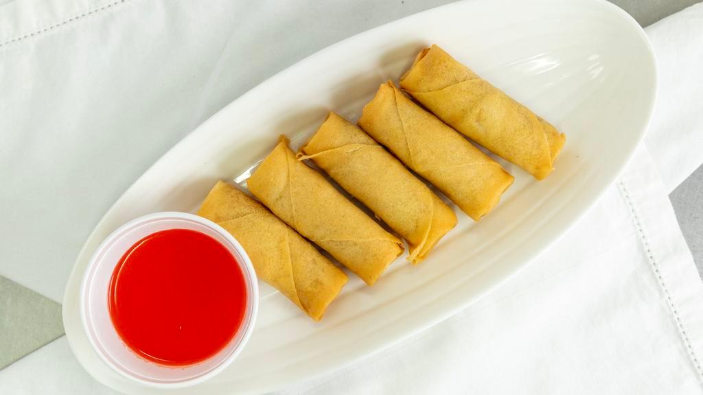 Spring Rolls · Two pieces.
