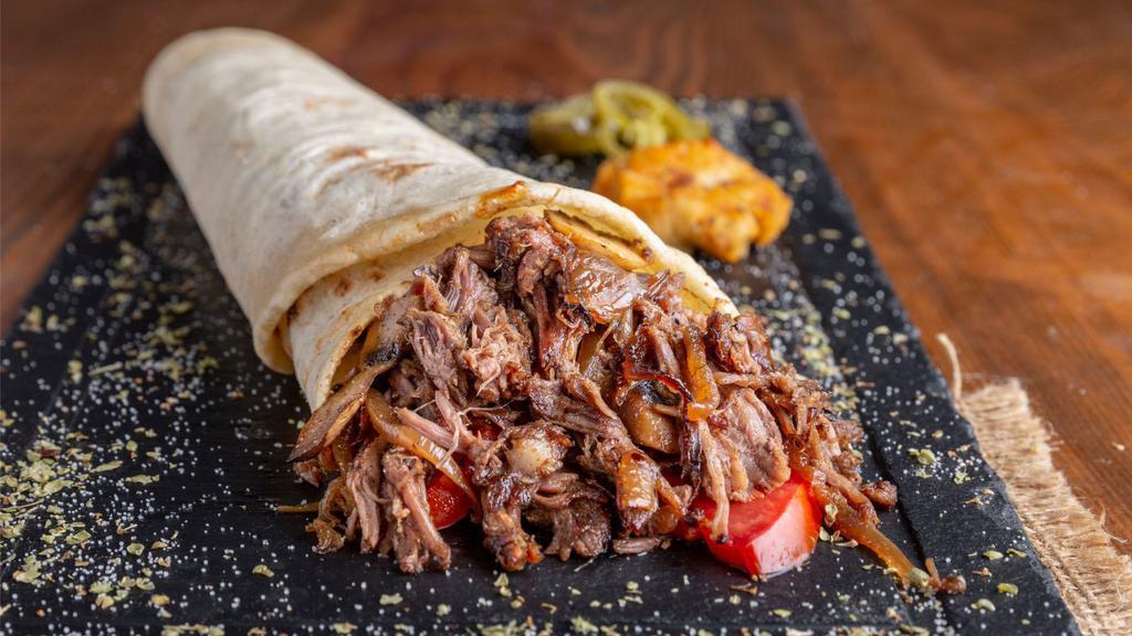 The Halal Gyro Wrap · NY classic gyro meat wrap made with lettuce, tomato, and chef's sauce.