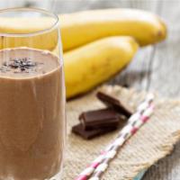 Choco Nana Smoothie · Smoothie made with fresh bananas, peanut butter, almond chocolate milk, and protein.