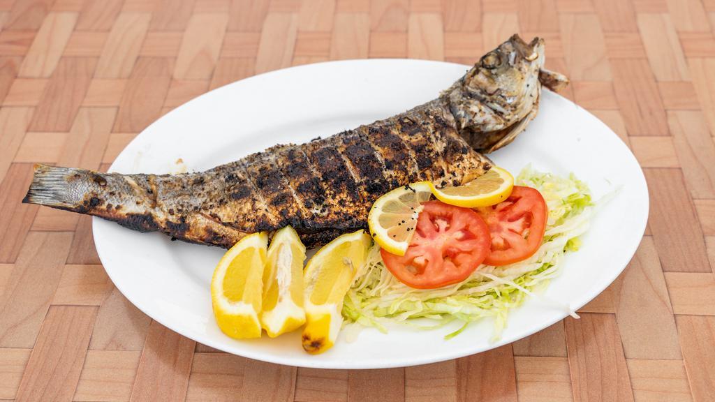 Bronzino (Whole) · whole fish cleaned and seasoned with Sea Salt,Black Pepper, Fresh Garlic , Fresh lemon