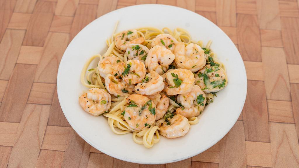 1/2 Lb Of 25-30  Wild Caught Shrimp Pasta  · 0.5lb of our 25-30 wild caught shrimp sautéed with fresh garlic basil and red sause with a touch of cream .