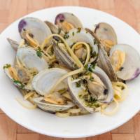 Clams In White Or Red Sause  · 1 dz sauteed clams in fresh garlic white wine and basil in red or white sause over penne or ...