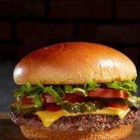 Manhattan Burger · A 4 oz fresh Angus beef patty, lettuce, tomato, onion, crunchy pickle chips, mayonnaise, ket...