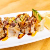 Crispy Duck Roll · Spring roll stuffed with duck.