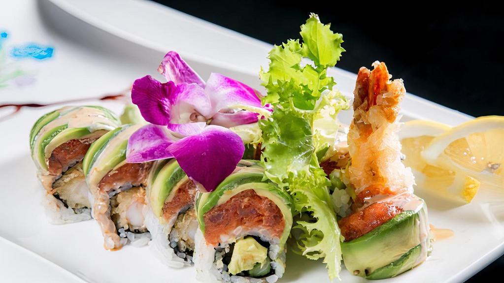 Takumi Roll · Shrimp tempura and asparagus inside, spicy tuna, avocado on top with chef's special sauce