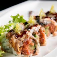 Phoenix Roll · Crunchy spicy tuna, avocado with eel, wasabi tobiko on top