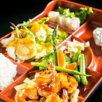 Bento Box  · Choose any two Entrees from A-F.Choose California roll or spicy tuna roll or salmon avocado ...