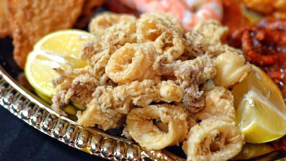 Fried Calamari · wild fresh calamari lightly floured & fried.