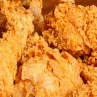 Fried Chicken · Seasoned with Jamaican spices and fried with an extra crispy outter layer. Moist on the insi...