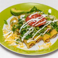 Flautas
 · (4) Crunchy corn tortilla chicken tacos topped with lettuce, tomato, sour cream and cheese. ...