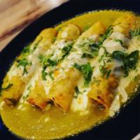 Enchiladas
 · (4) Chicken enchiladas in green sauce or mole sauce. Topped with cheese. Served with rice an...