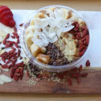 Superfood Edge · Acai topped with banana, almond slices, goji berries, coconut flakes, cacao nibs, hemp seeds...