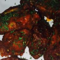 Buffalo Chicken Wings · Served with carrots, celery and choice of homemade ranch or blue cheese dressing.
