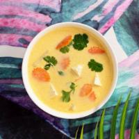 Vegan Yellow Curry · Turmeric and coconut milk curry with your choice of tofu or vegetables.