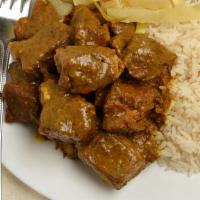 Curried Goat · Americans spices added directly to the meat, rubbing in the flavor with hands. When satisfie...