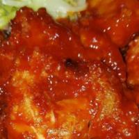 Sweet & Spicy · Prepared similar to the Jamaican Fried Chicken, it is then dipped in our secret and speciall...