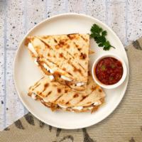 Quesadillas · Follow Your Heart cheese wrapped in a grilled tortilla.