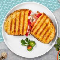 Ciao! Italiano Panini · Grilled chicken, roast pepper, fresh mozzarella and pesto sauce.