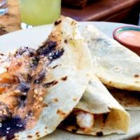 Carnitas Tacos · Coffee rubbed pork, grilled pineapple, slaw, cilantro, onions, al pastor sauce