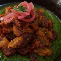 Crispy Pork Belly In Salsa Verde · Rancherito flavored pork belly, poblano & mint salsa verde, pickled onion