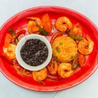 Shrimp Mexicana · Shrimp sauteed w/butter and covered in fresh tomatoes, peppers, and onions.