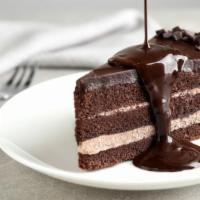 Chocolate Mousse Cake · Soft and moist chocolate cake layer topped with super creamy chocolate mousse.